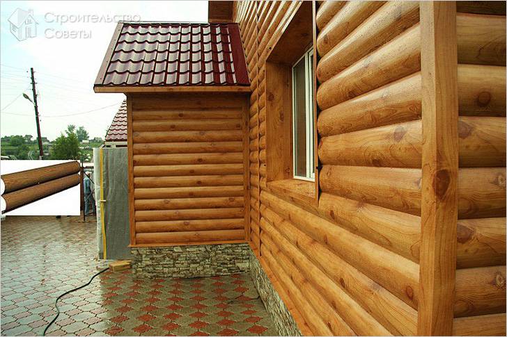 Обшивка дома сайдингом под бревно