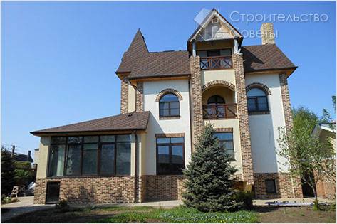 Оштукатуривание фасада дома