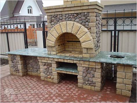 Отделка печи из натурального камня