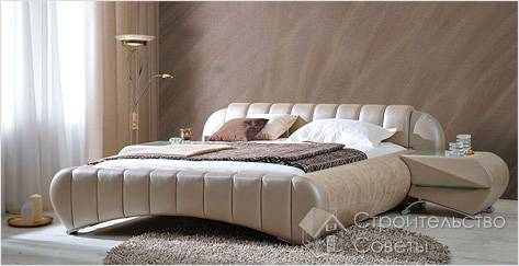 Красивая дизайнерская кровать с тумбочкой